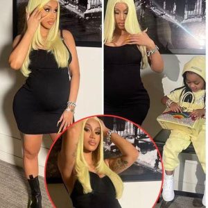 Cardi B features her child knock in a skintight dark dress in the wake of affirming plans to team up with Lizzo