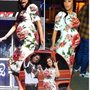 Cardi B flaunts her blooming child stomach in sticking dress as she performs with life partner Offset