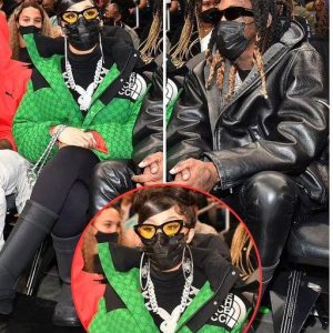 Cardi B and spouse Offset watch the Chicago Bulls go head to head against Atlanta Falcons at State Homestead Field
